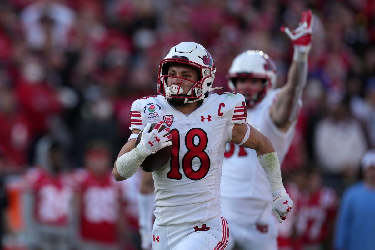Utah Utes wide receiver Britain Covey (18) carries the ball on a 97-yard kickoff return in the second quarter against the Ohio State Buckeyes during the 2022 Rose Bowl at Rose Bowl. Ohio State defeated Utah 48-45.